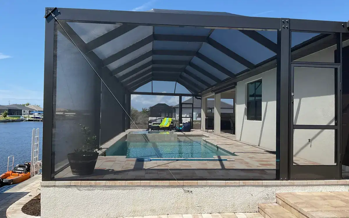 Pool enclosure with patio area